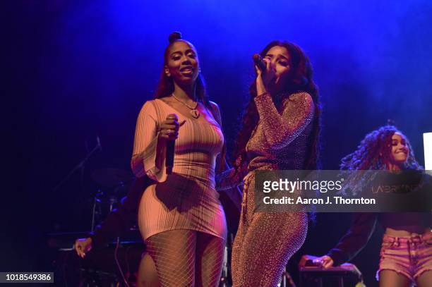 Singers LaBritney and Kash Doll perform on stage during the 'Keep That Same Energy' Tour at The Majestic Theater on August 17, 2018 in Detroit,...
