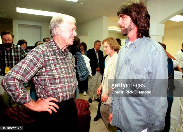 Teddy Gentry of Country Group Alabama and Former President Jimmy Carter backstage at Peachtree City Amphitheater Circa 1984 in Atlanta, Georgia.