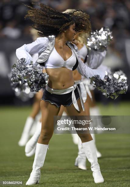 The Oakland Raiders cheerleaders the Raiderettes performs during an NFL preseason football game against the Detroit Lions at Oakland Alameda Coliseum...