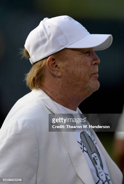 Owner Mark Davis of the Oakland Raiders looks on while his team warms up prior to the start of a preseason NFL football game against the Detroit...