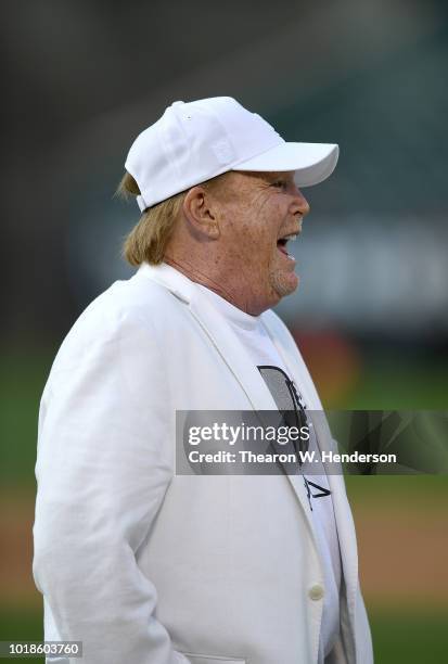 Owner Mark Davis of the Oakland Raiders looks on while his team warms up prior to the start of a preseason NFL football game against the Detroit...