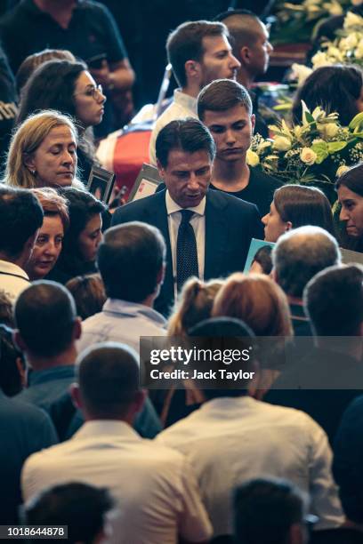 Prime Minister of Italy Giuseppe Conte meets with mourners as he attends a State funeral service for the victims of the Morandi Bridge disaster at...
