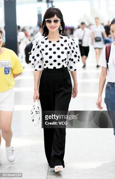 Actress Angie Chiu arrives at airport on August 6, 2018 in Shenzhen, Guangdong Province of China.