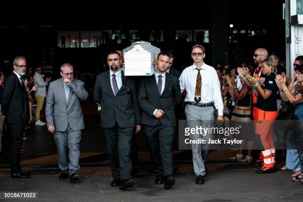 The coffin nine-year-old Samuel Robbiano is carried out following a State funeral service for victims of the Morandi Bridge disaster at the Fiera di...