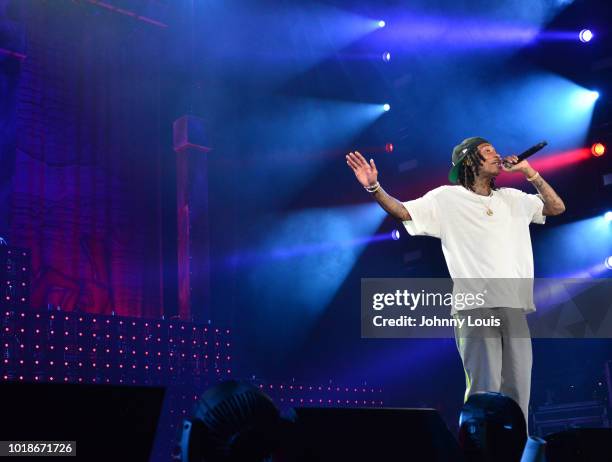 Wiz Khalifa performs on stage at Perfect Vodka Amphitheatre on August 17, 2018 in West Palm Beach, Florida.