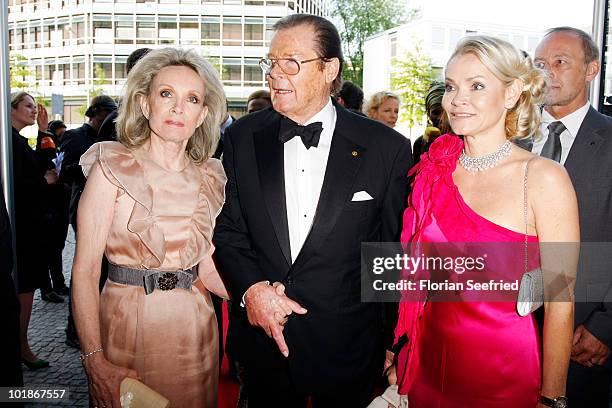 Actor Roger Moore and partner Kiki Tholstrup and her daughter Christina Knudsen attend An Evening For Africa at the Burda Medien Park on June 7, 2010...