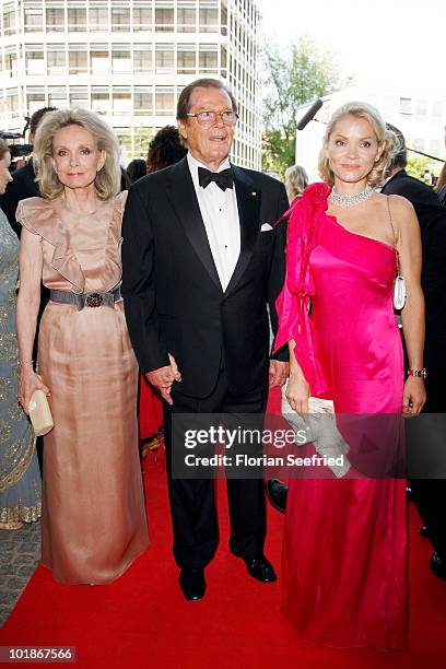 Actor Roger Moore and partner Kiki Tholstrup and her daughter Christina Knudsen attend An Evening For Africa at the Burda Medien Park on June 7, 2010...