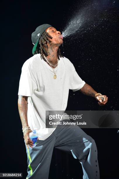 Wiz Khalifa performs on stage at Perfect Vodka Amphitheatre on August 17, 2018 in West Palm Beach, Florida.