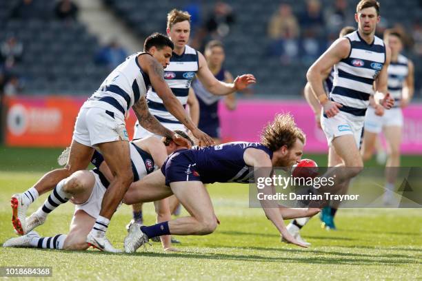 David Mundy of the Dockers dives for the ball during the round 22 AFL match between the Geelong Cats and the Fremantle Dockers at GMHBA Stadium on...