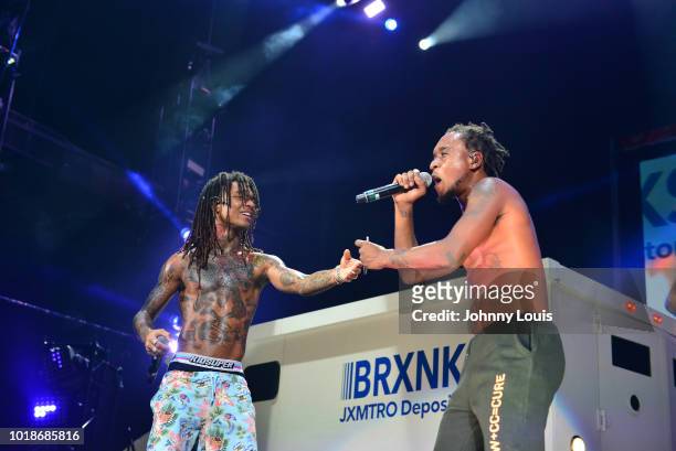Slim Jxmmi and BoBo Swae Lee of Rae Sremmurd perform on stage at Perfect Vodka Amphitheatre on August 17, 2018 in West Palm Beach, Florida.