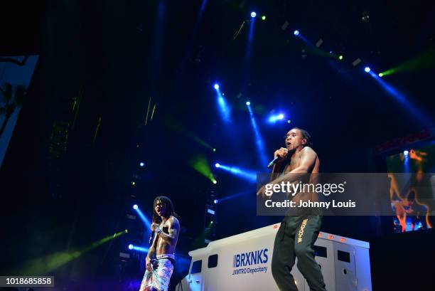 Slim Jxmmi and BoBo Swae Lee of Rae Sremmurd perform on stage at Perfect Vodka Amphitheatre on August 17, 2018 in West Palm Beach, Florida.