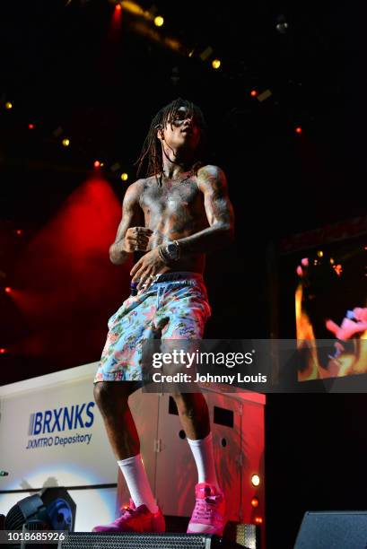 Slim Jxmmi of Rae Sremmurd performs on stage at Perfect Vodka Amphitheatre on August 17, 2018 in West Palm Beach, Florida.