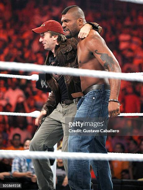 Sharlto Copley and Quinton 'Rampage' Jackson attend WWE Monday Night Raw at American Airlines Arena on June 7, 2010 in Miami, Florida.
