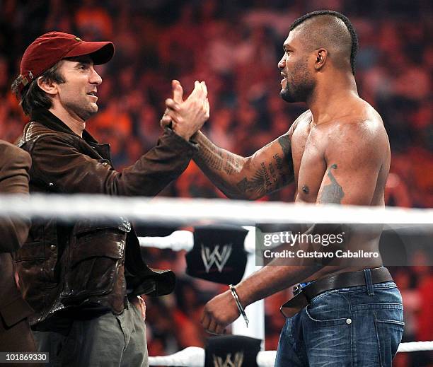 Sharlto Copley and Quinton 'Rampage' Jackson attend WWE Monday Night Raw at American Airlines Arena on June 7, 2010 in Miami, Florida.