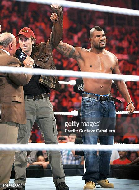 Gene Okerlund, Sharlto Copley and Quinton 'Rampage' Jackson attend WWE Monday Night Raw at AmericanAirlines Arena on June 7, 2010 in Miami, Florida.