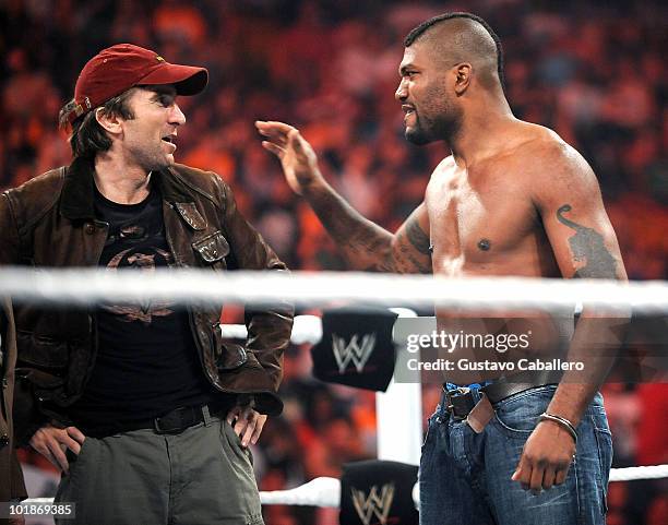 Sharlto Copley and Quinton 'Rampage' Jackson attend WWE Monday Night Raw at American Airlines Arena on June 7, 2010 in Miami, Florida.