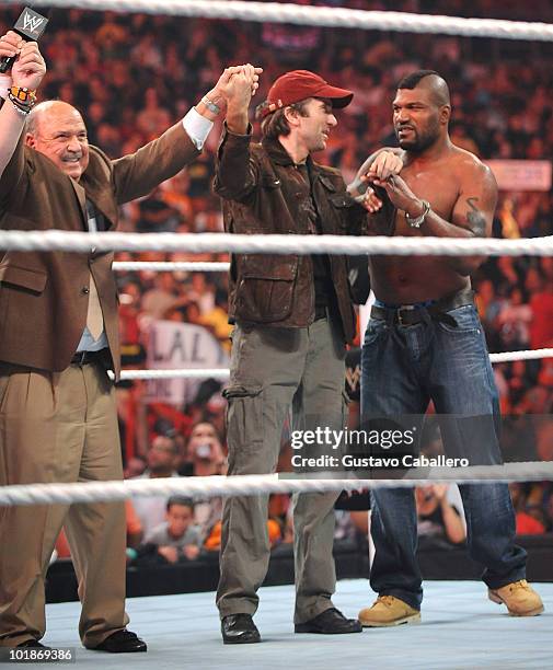 Gene Okerlund, Sharlto Copley and Quinton 'Rampage' Jackson attend WWE Monday Night Raw at AmericanAirlines Arena on June 7, 2010 in Miami, Florida.