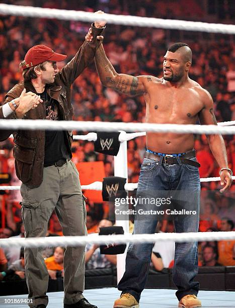 Sharlto Copley and Quinton 'Rampage' Jackson attend WWE Monday Night Raw at American Airlines Arena on June 7, 2010 in Miami, Florida.