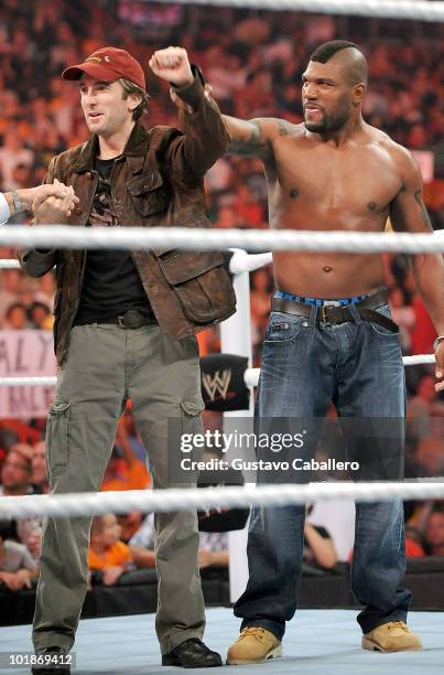 Sharlto Copley and Quinton 'Rampage' Jackson attend WWE Monday Night Raw at American Airlines Arena on June 7, 2010 in Miami, Florida.