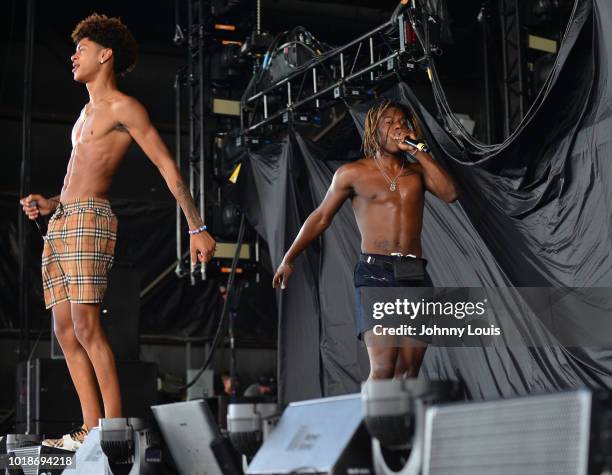 Rico Pressley and Liamette Gray perform on stage at Perfect Vodka Amphitheatre on August 17, 2018 in West Palm Beach, Florida.