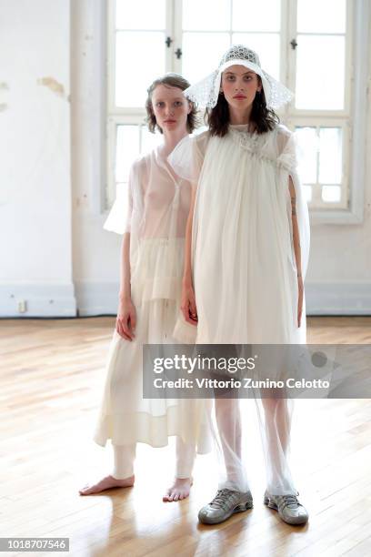 Models pose during the rehearsal ahead of the Cathrine Hammel show during Oslo Runway SS19 at Bankplassen 4 on August 14, 2018 in Oslo, Norway.