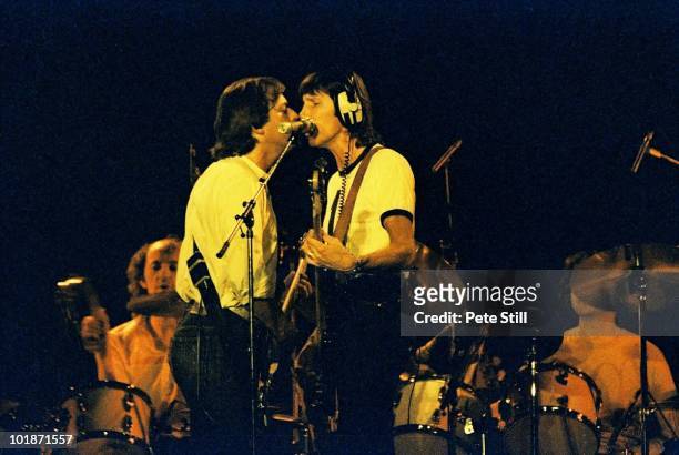 David Gilmour and Roger Waters of Pink Floyd perform on stage at Earls Court Arena on 'The Wall' tour, on August 7th, 1980 in London, England.