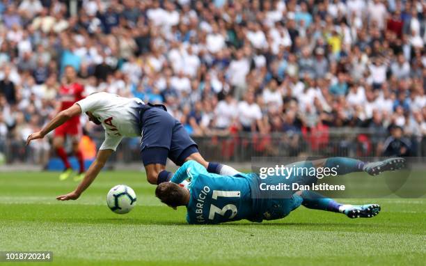 Lucas Moura of Tottenham Hotspur and Fabricio Agosto Ramirez of Fulham clash during the Premier League match between Tottenham Hotspur and Fulham FC...