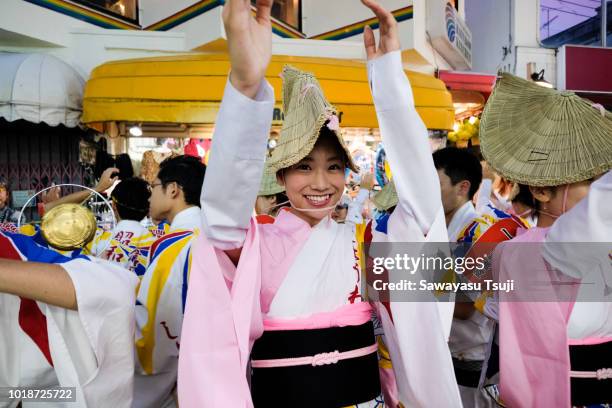 Participants perform the Awa Odori folk dance during the Awa Odori festival on August 18, 2018 in Tokyo, Japan. Awa Odori is a popular dance festival...