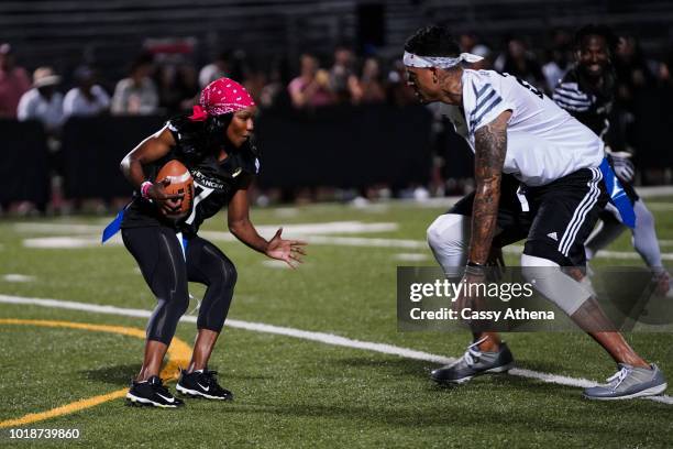 Carmelita Jeter plays against Matt Barnes at the 5th Annual Athletes vs. Cancer celebrity flag football game hosted by Matt Barnes and Snoop Dogg on...