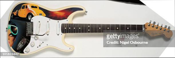 Studio still life of a 1989 Fender Stratocaster 'Hot Rod' guitar, owned by Jeff Beck, photographed in the United Kingdom.