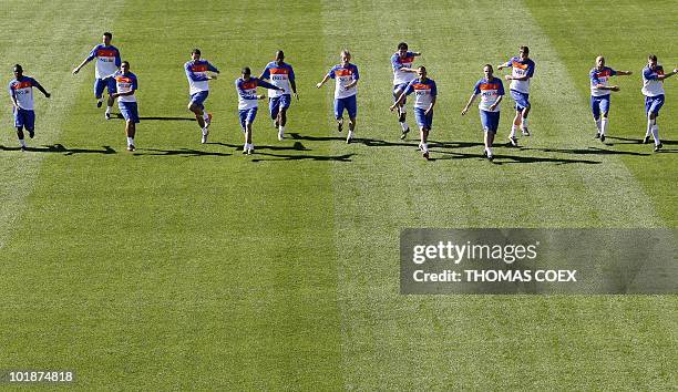 Netherlands' national football team players exercise during a training session at the Wits University in Johannesburg, on June 8, 2010 ahead of the...