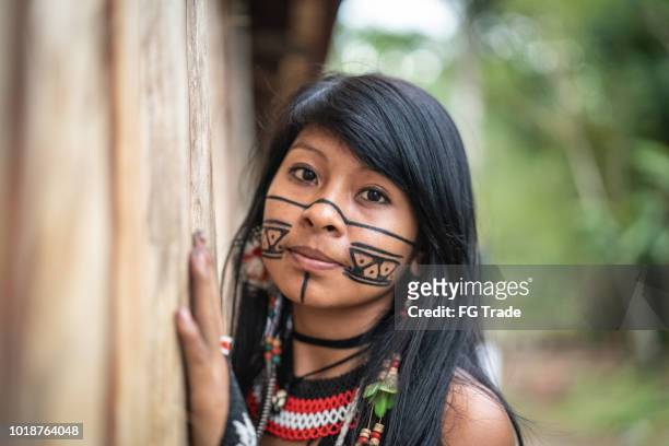 indigenous brazilian young woman, portrait from guarani ethnicity - amazon jungle girls stock pictures, royalty-free photos & images
