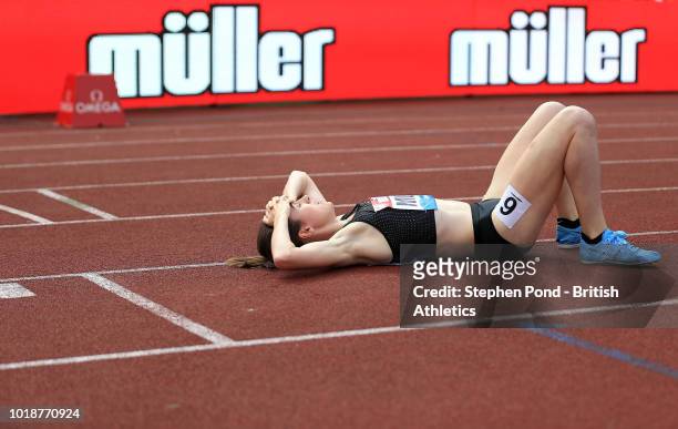 Laura Muir of Great Britain lies on the track after winning the Women's 1000m during the Muller Grand Prix Birmingham IAAF Diamond League event at...