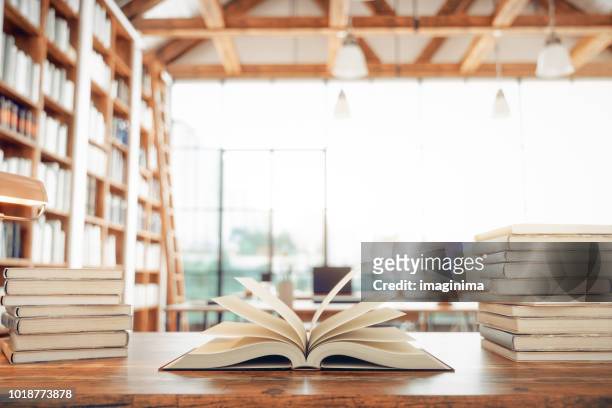 library and books - stack of books stock pictures, royalty-free photos & images