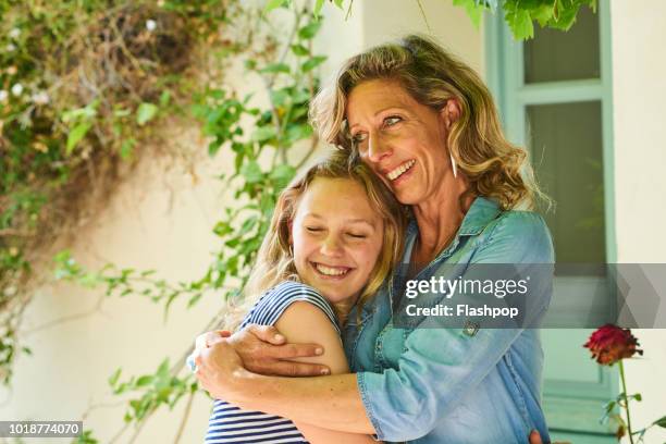 mother and daughter - adolescent daughter mother portrait stock-fotos und bilder