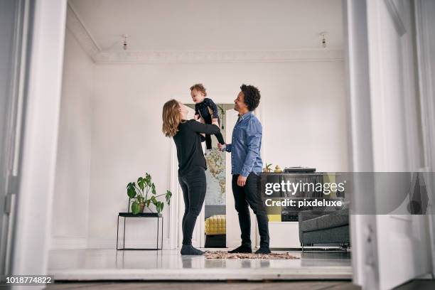 they'll raise him the right way - denmark people happy stock pictures, royalty-free photos & images