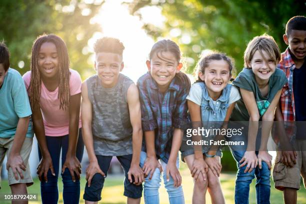 kids posing outside - 10-15 2018 stock pictures, royalty-free photos & images