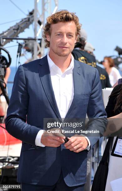 Actor Simon Baker from the TV series "The Mentalist" poses during the 2010 Monte Carlo Television Festival held at Grimaldi Forum on June 8, 2010 in...