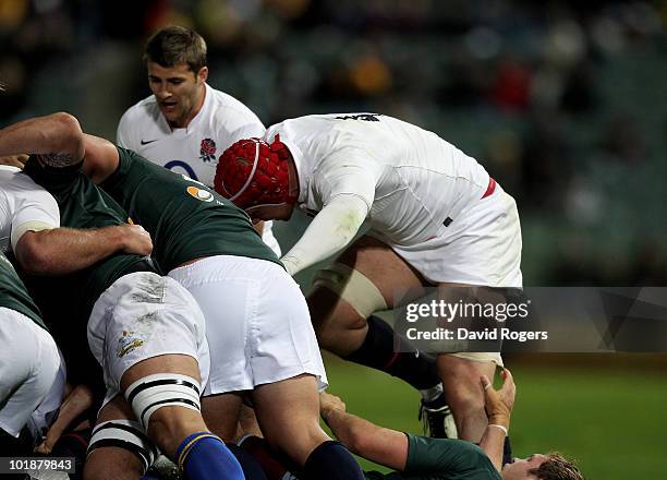 Dave Attwood the England lock rucks during the match between the Australian Barbarians and England at the Members Equity Stadium on June 8, 2010 in...
