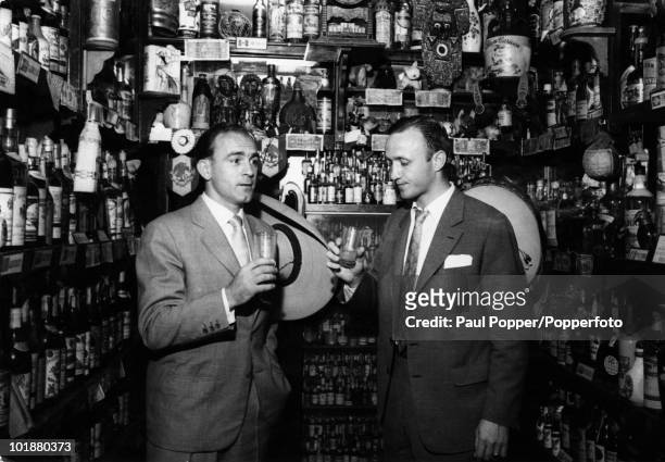 Argentine-Spanish footballer Alfredo di Stefano of Real Madrid attends a party in the wine cellar of Perico Chicote in Madrid, 11th June 1959. The...