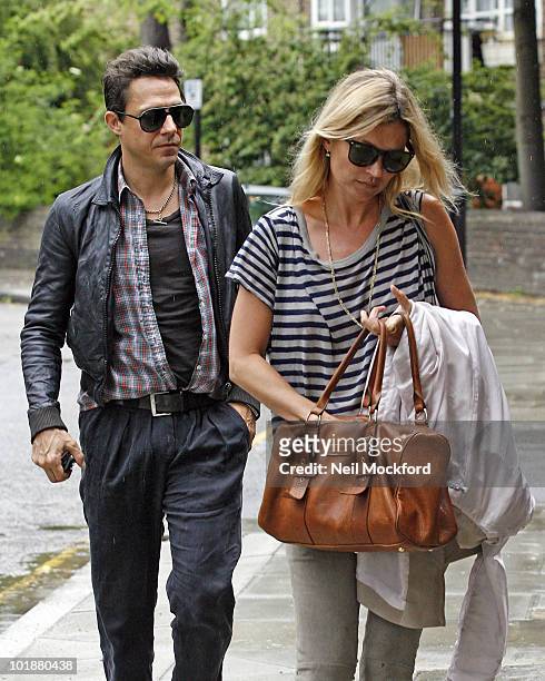 Jamie Hince and Kate Moss sighted arriving home on June 8, 2010 in London, England.