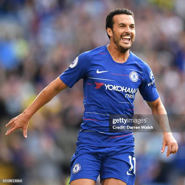 Pedro of Chelsea celebrates after scoring his team's first goal during the Premier League match between Chelsea FC and Arsenal FC at Stamford Bridge...
