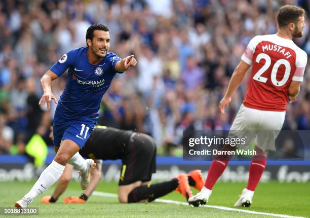 Pedro of Chelsea celebrates after scoring his team's first goal during the Premier League match between Chelsea FC and Arsenal FC at Stamford Bridge...