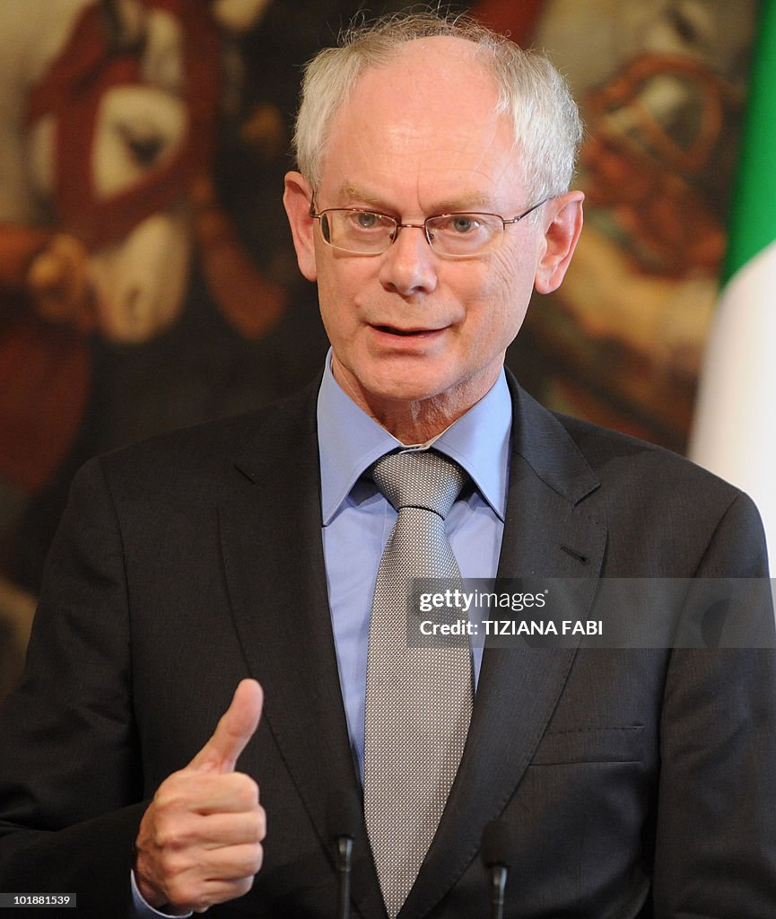 Herman Rompa European Union President Herman Van Rompuy gestures as he gives a ...