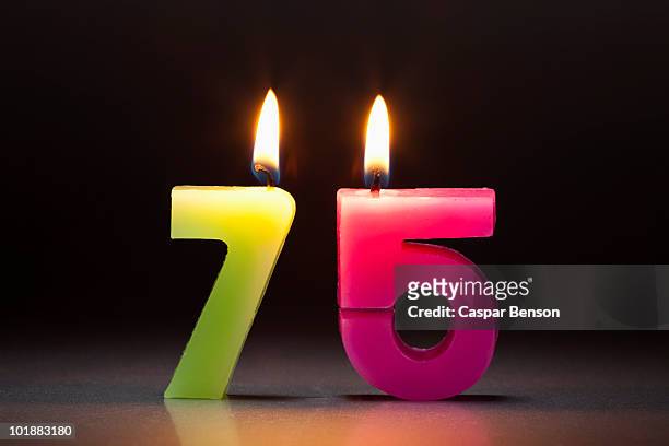 two candles in the shape of the number 75 - number candles stock pictures, royalty-free photos & images