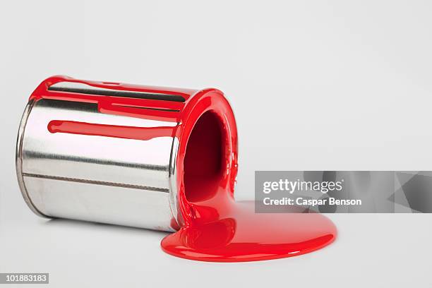 red paint spilling from a paint can - dump stock pictures, royalty-free photos & images