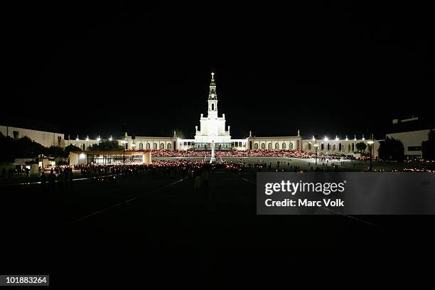 crowd gathered at lady of fatima cathedral, fatima, portugal - fatima portugal stock pictures, royalty-free photos & images