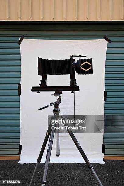 a old-fashioned camera and back drop set up for a photo shoot,  broome, western australia, australia - photo shoot set up stock pictures, royalty-free photos & images