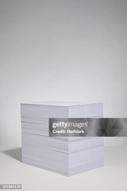 a stack of white paper - ream of paper stock pictures, royalty-free photos & images