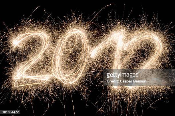2012 written with a sparkler - 2012 stock pictures, royalty-free photos & images